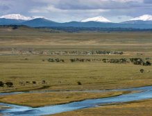 The Rio Grande flows through the meager valley